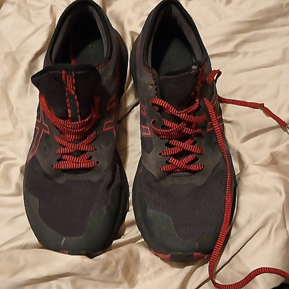 New pair. Old pair of running shoes Asics